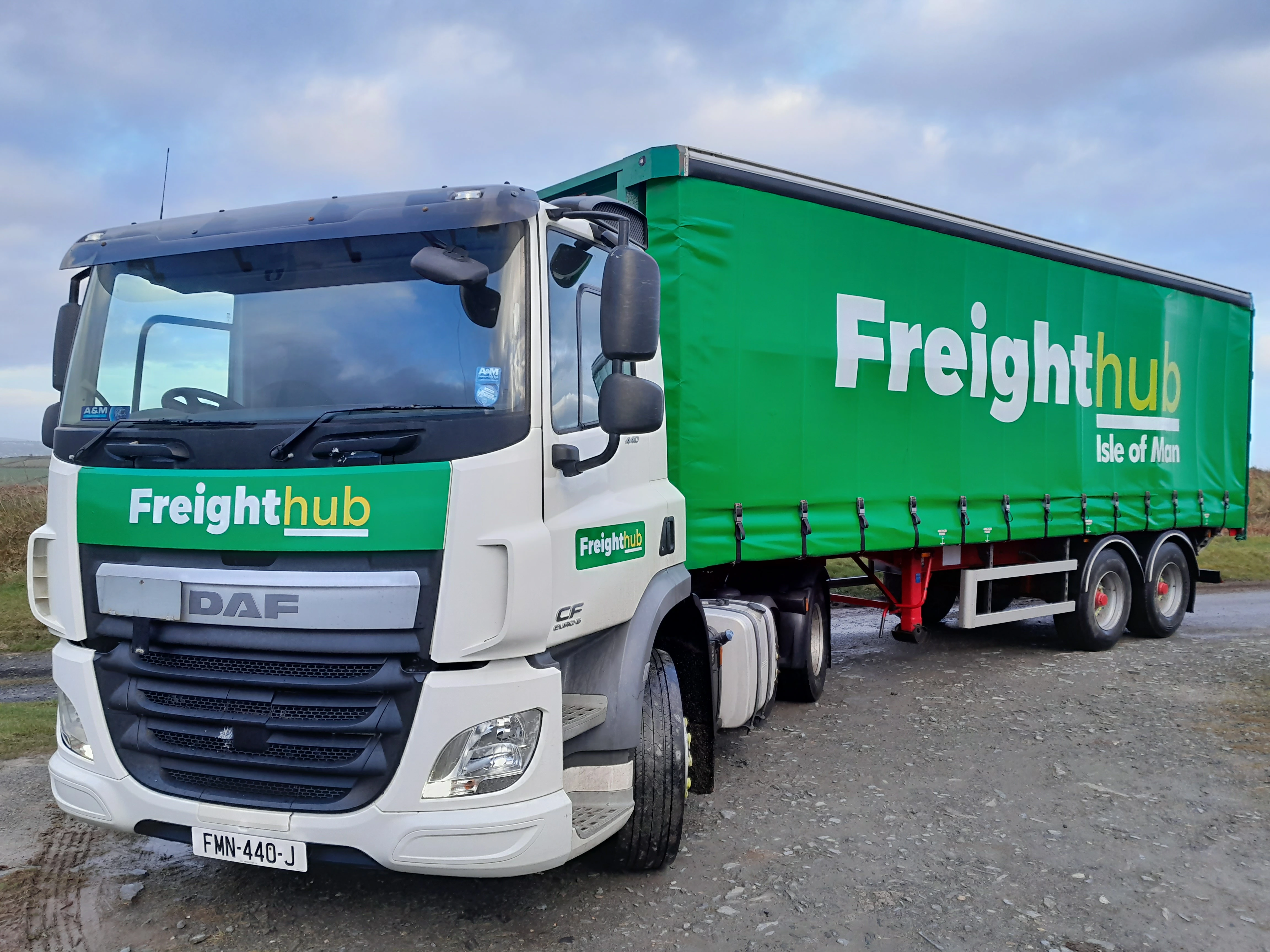 Truck reversed into delivery bay with open door